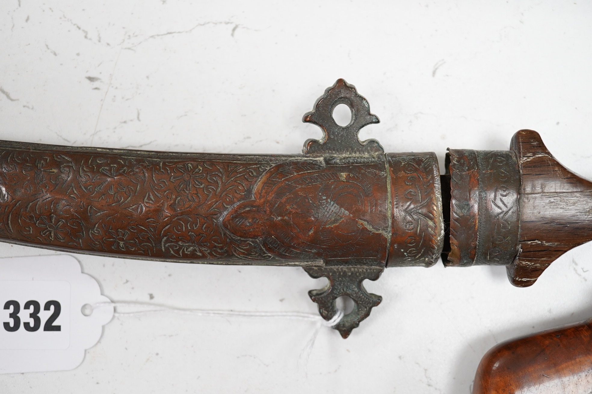 Two Kris daggers, a jambiya dagger and an Indonesian horn powder flask, longest 41.5cm. (4). Condition - poor to fair